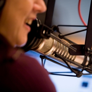 Picture of a volunteer recording a program
